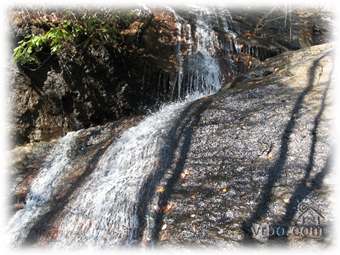 Hike to this beautifful 60 foot waterfall which is on the property.